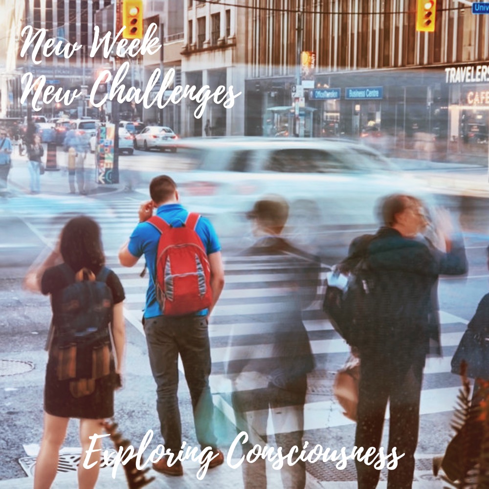 City street scene with pedestrians crossing, motion blur.