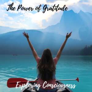 Woman canoeing on lake, arms raised in gratitude.