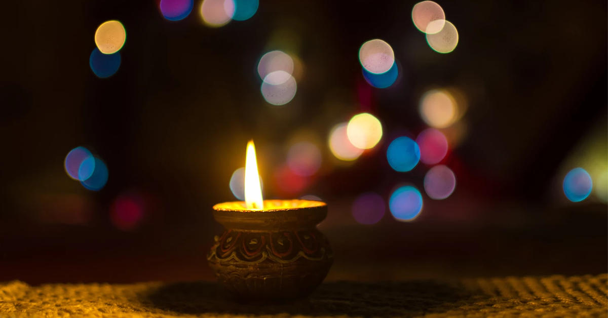 Diwali diya lamp with bokeh lights
